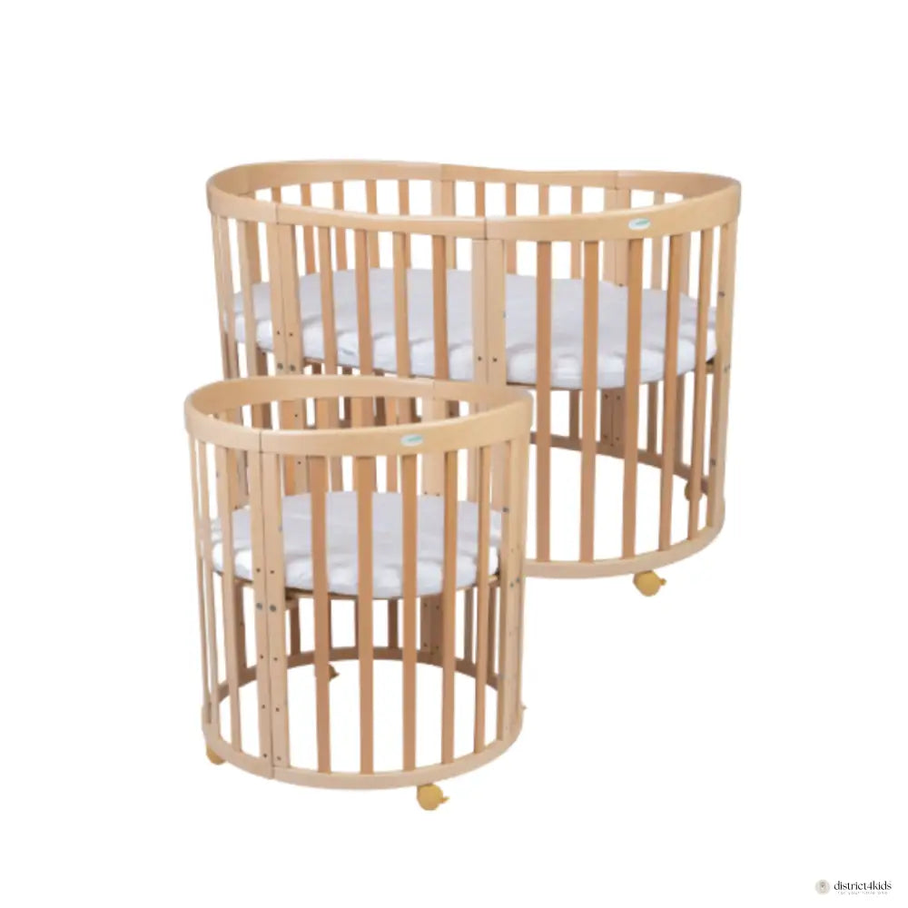 Babybett 7-in-1 – Ein Bett für viele Jahre - mitwachsend | Ovale Form